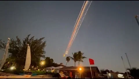 a plane flying in the sky