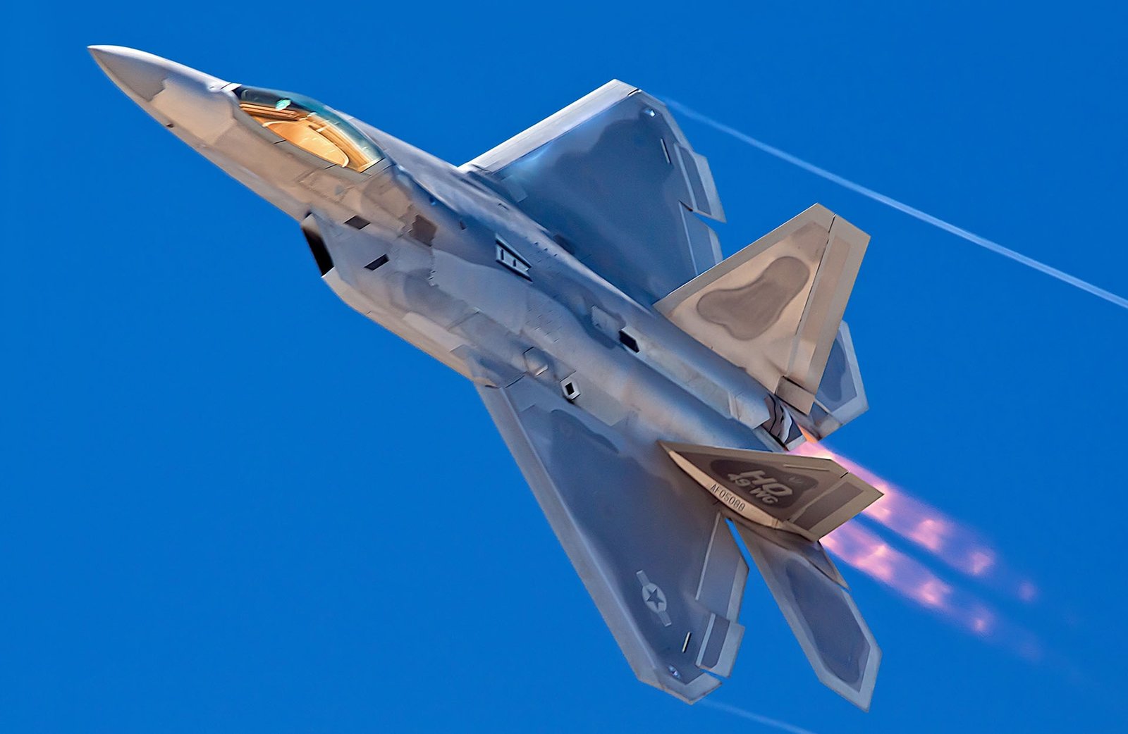 F-22 fighter jets flying in sky blue-Sky Sovereignty: The 5 Most Lethal Fighter Jets Dominating the Clouds in 2026
