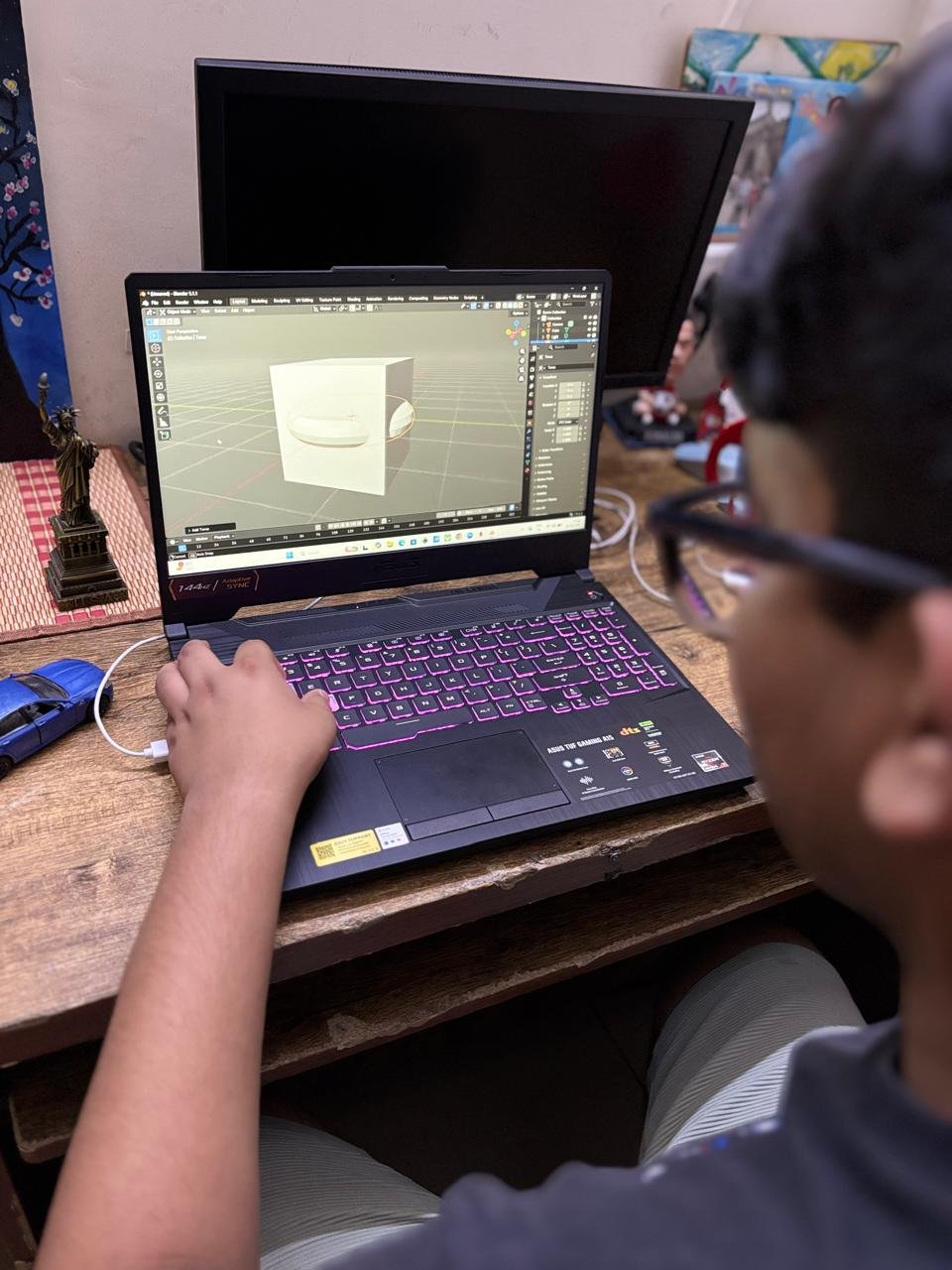 Elite Aesthetic: The RGB backlit keyboard in various settingss-How the ASUS TUF Gaming A15 is the Ultimate Budget-Friendly Powerhouse for AI Engineers and Creators