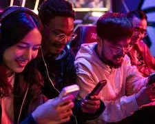 A group of people using smartphones-Best Budget Powerhouses Smartphones You Can Buy in 2026